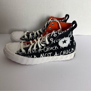 Converse Black and White High-Top Sneakers with Graffiti Design